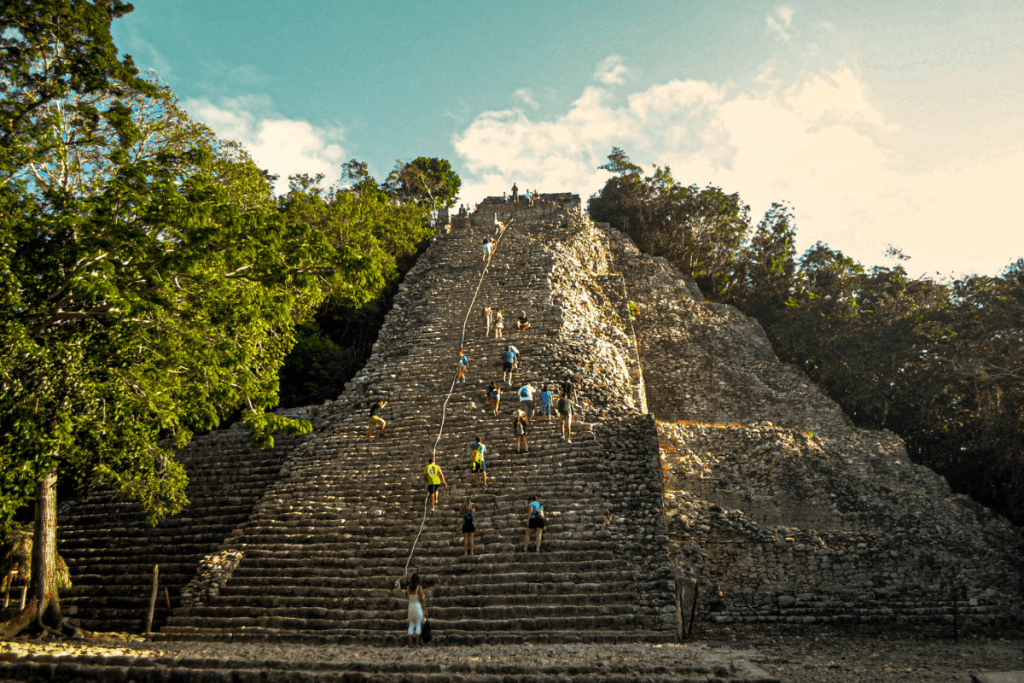 climbing-coba-pyramids-in-yucatan-peninsula-mexico-female-travel