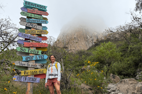 day-trip-to-peña-de-bernal-woman-in-front-of-monolith