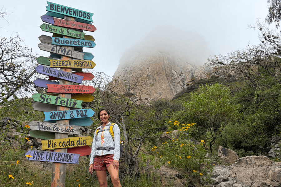 day-trip-to-peña-de-bernal-woman-in-front-of-monolith